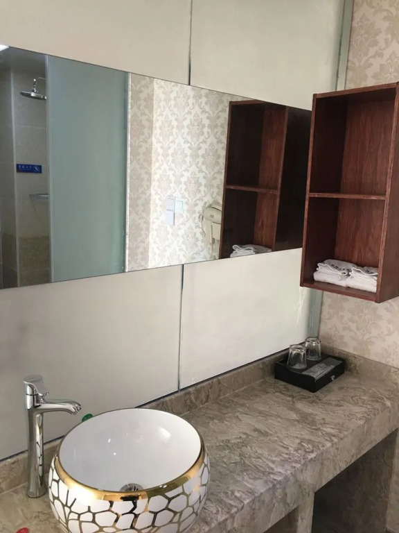 Tie Cheng Apartment Hotel