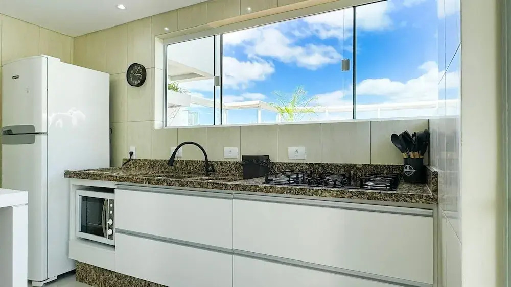 Apartamentos com piscinas na praia de Bombas