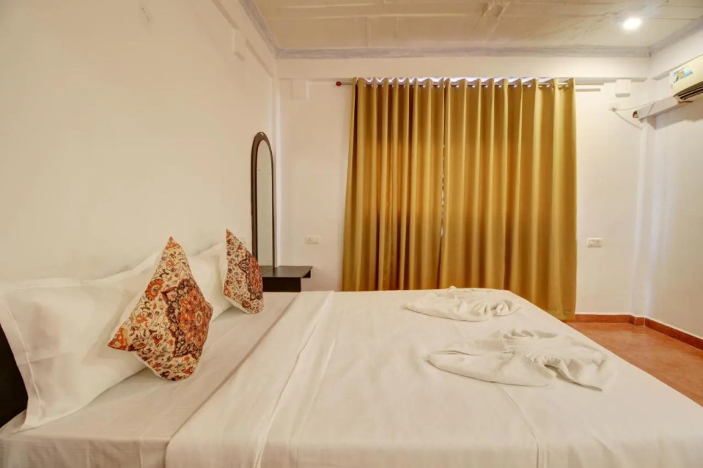 Hotel pleasure inn near turtle beach morjim Manage by ld group of hospitality