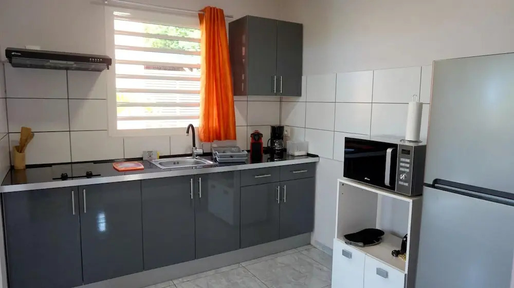 Apartment With one Bedroom in Deshaies, With Shared Pool, Enclosed Garden and Wifi - 900 m From the Beach