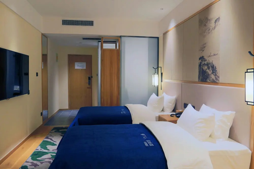 Qianna Hotel Zhongzhou Avenue Branch