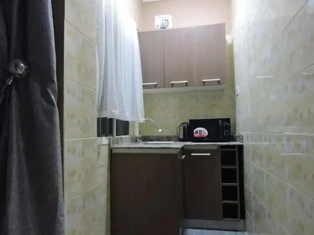 Wig and Gown Apartment