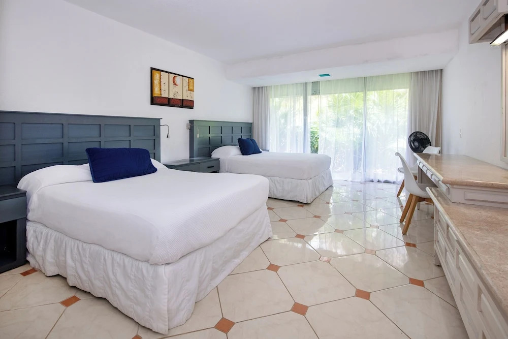 Cancun Jr Suite en resort vista al mar