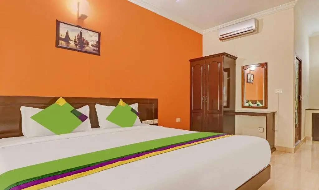 Treebo Trend Green Palm Resorts