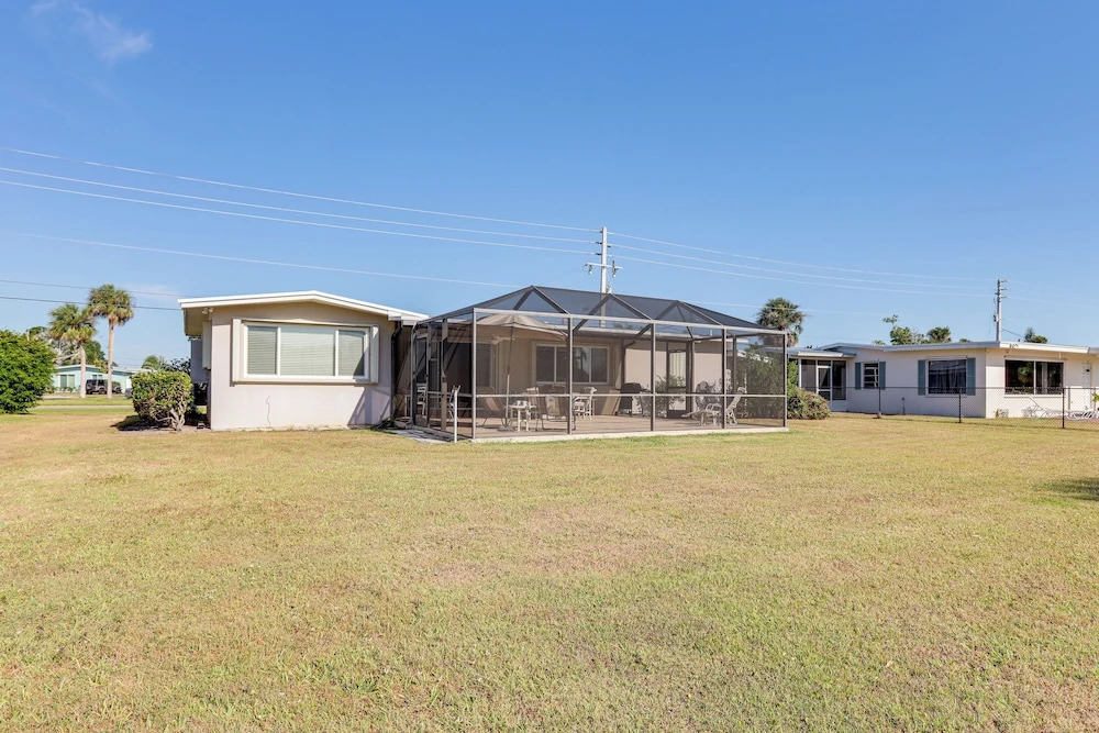 Sunny Port St Lucie Home: Lanai & Golf Course View