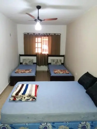 SUíTE EM NOSSA CASA A 450M DA PRAIA