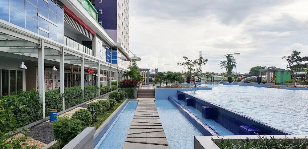 Furnished Studio with Comfortable Design Green Pramuka Apartment