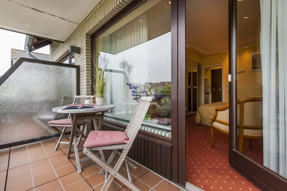 Büngers Apartment-Hotel mit Gartensauna - modern, gemütlich und strandnah