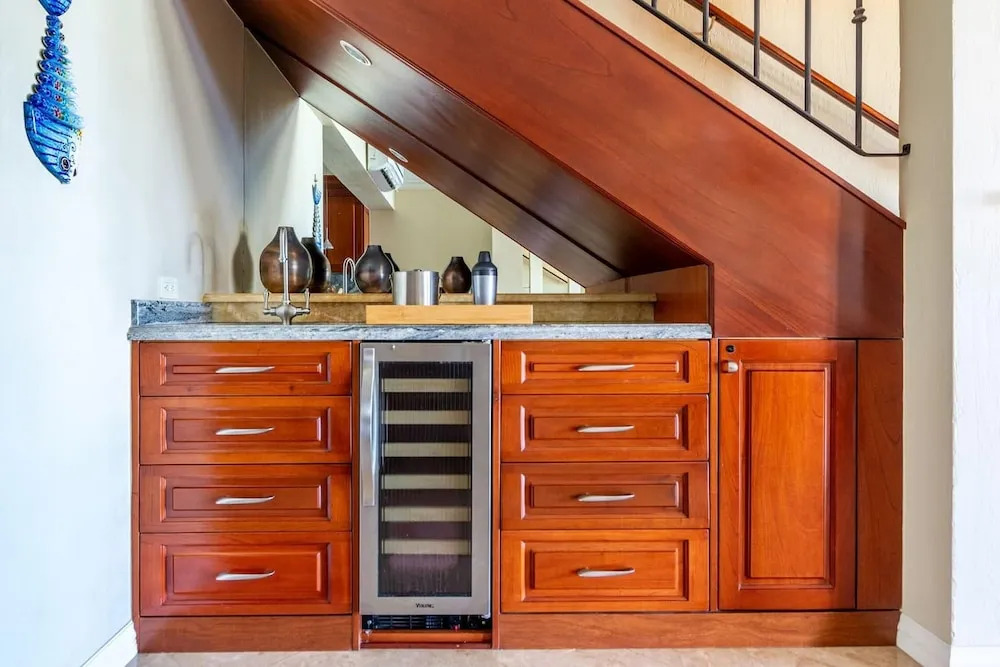 Stylish Split-Level Condo with a Shaded Terrace, Direct Beach Access, and Resort-Style Community Amenities