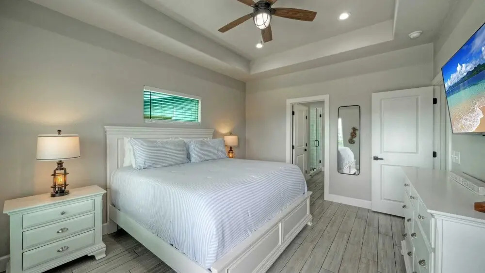 Bayfront Home w/ Pool, Game Room + Walk to Beach & Golf Cart Access Pelicans Perch by Avantstay