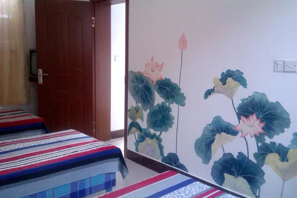 Rongjun Yujiale Hotel(蓬莱荣君渔家乐)