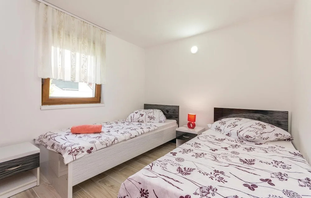 Four-Bedroom Holiday Home In Pakostane
