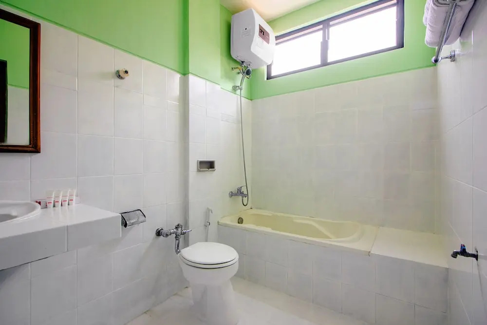 Oyo 1602 Trim Tiga Hotel