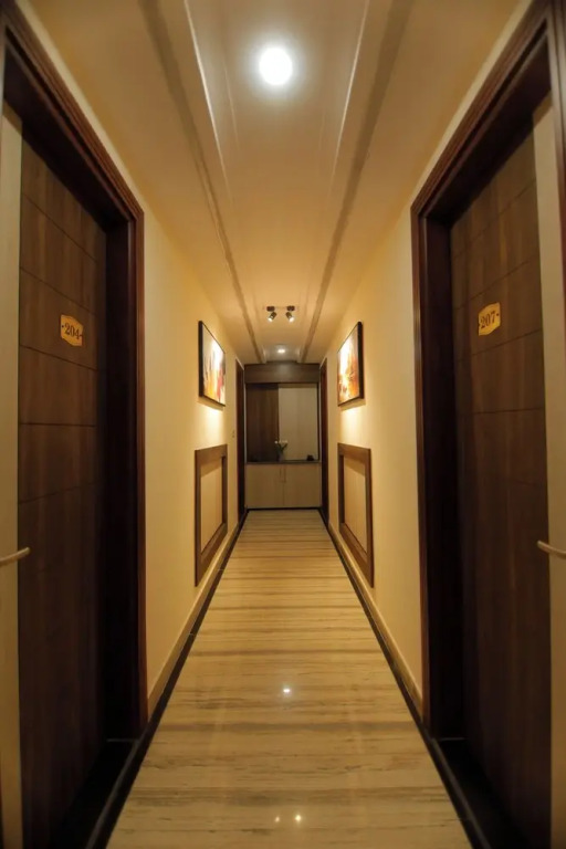 Treebo Premium Paarth Grand with Pure Veg Restaurant