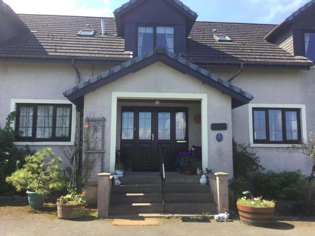 Woodcock Faulds House
