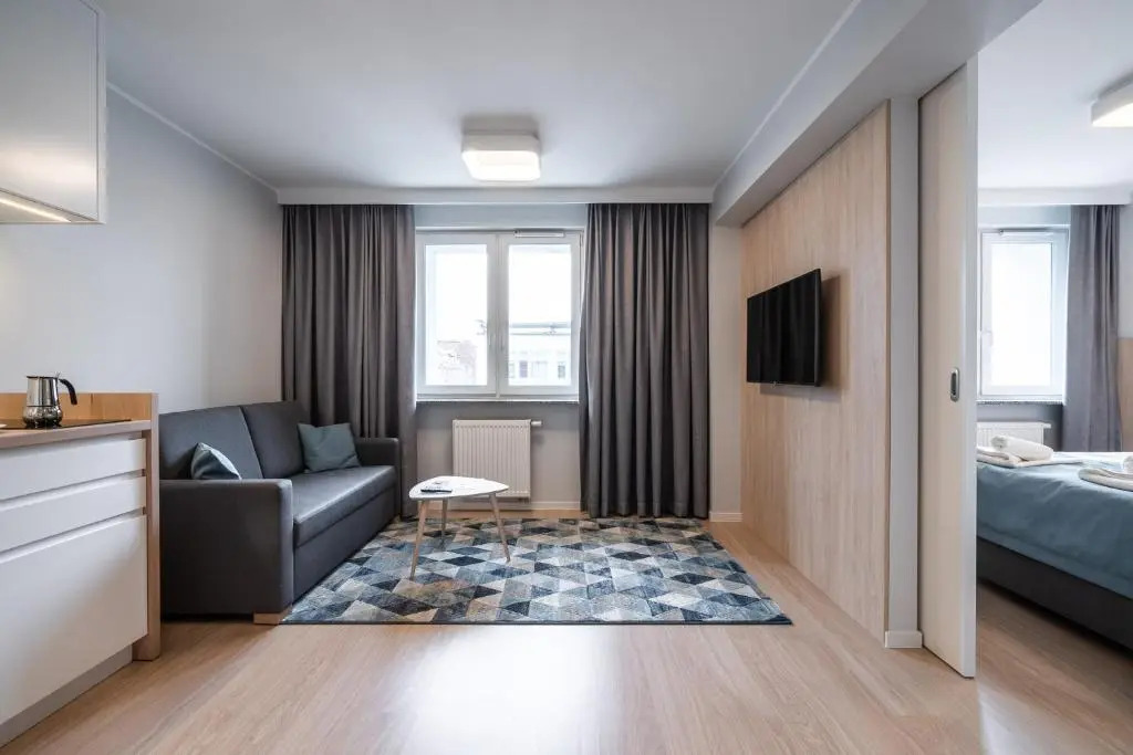 Q19 Apartments Rynek
