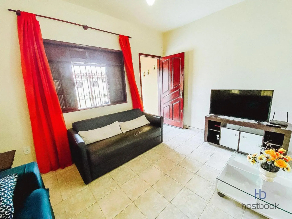 Casa a 300 metros da praia do Centro - WIFI 200MB - Netflix - 2 Quartos - Cozinha equipada - Churrasqueira - Pet friendly - Quintal