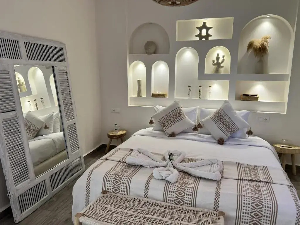 RIAD RIME QOUSSAI