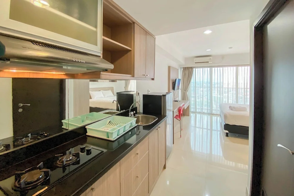 Homey And Cozy Living Studio At Tamansari The Hive Apartment