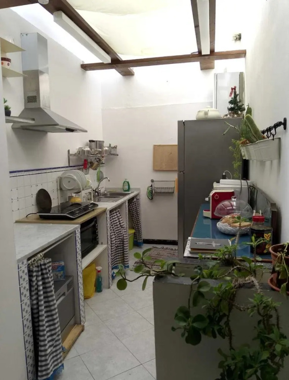 Spacious and Naturally Bright Bomboniera Rooftop Favors Apartment