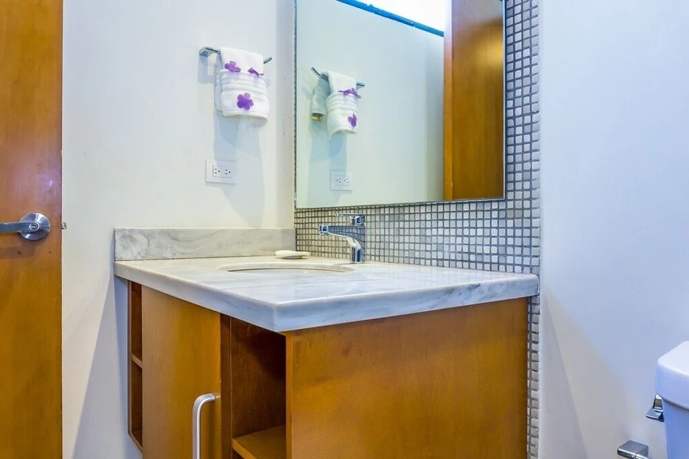 Lunada 314 Modern Playa del Carmen Condo with Tropical Garden View by RedAwning