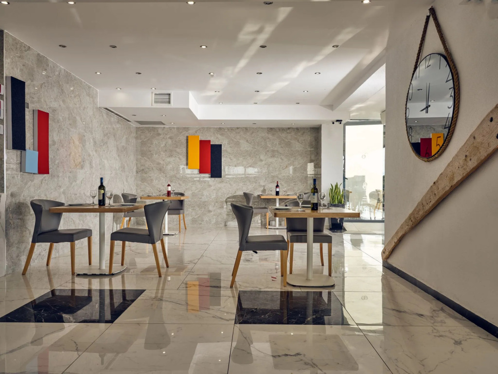 Cavo Orient Beach Hotel & Suites