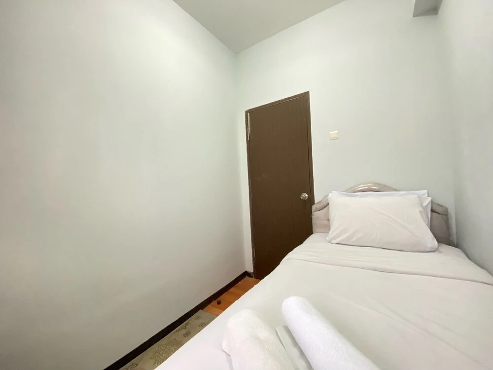 Modern Designed 2BR at Suites @Metro Apartment By Travelio