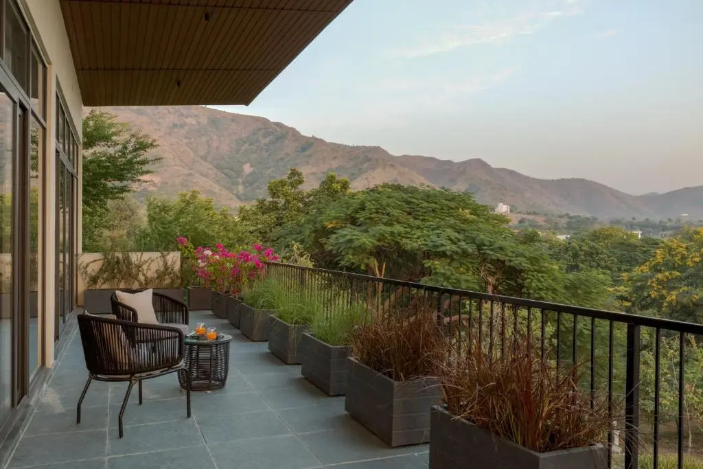 SaffronStays Camelot by the Lake - 3BR villa with glass walls, TT, projector, and gardens, Udaipur