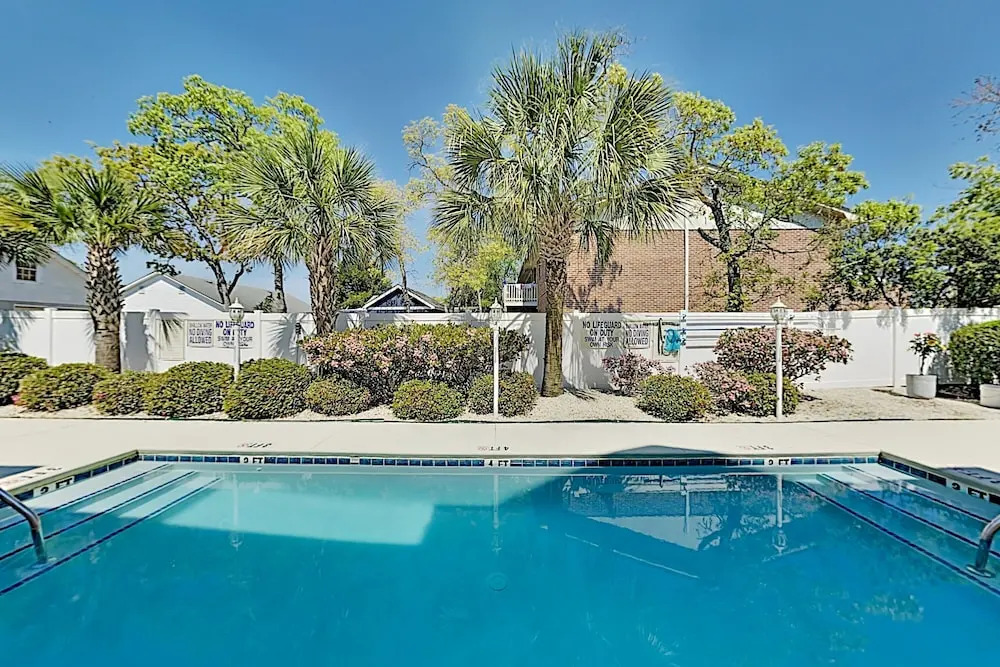 Sun-Soaked Beach Townhome w/ Sparkling Pool townhouse