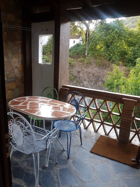 Little House With Fireplace And Terrace In Natural Environment