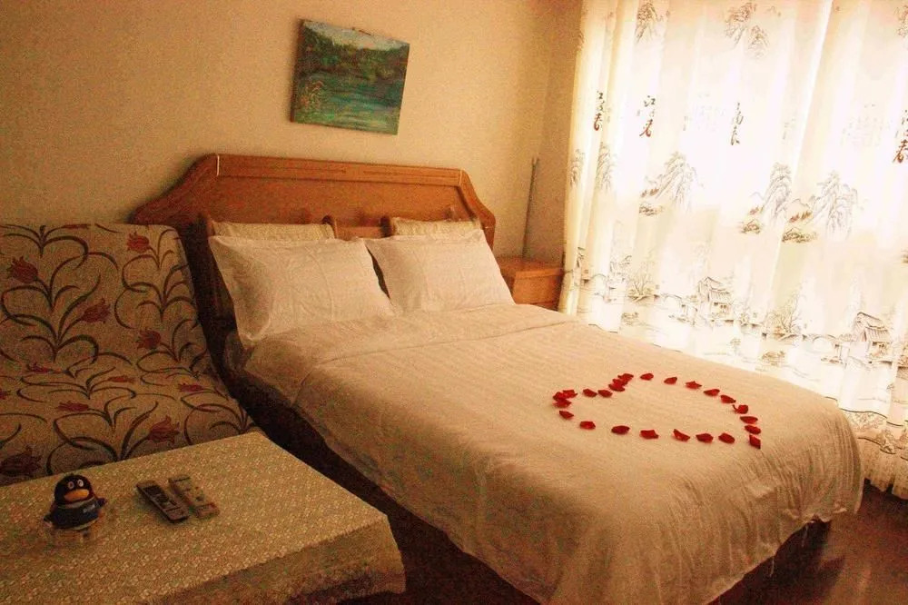 Yangguang Xingzuo Apartment Hotel
