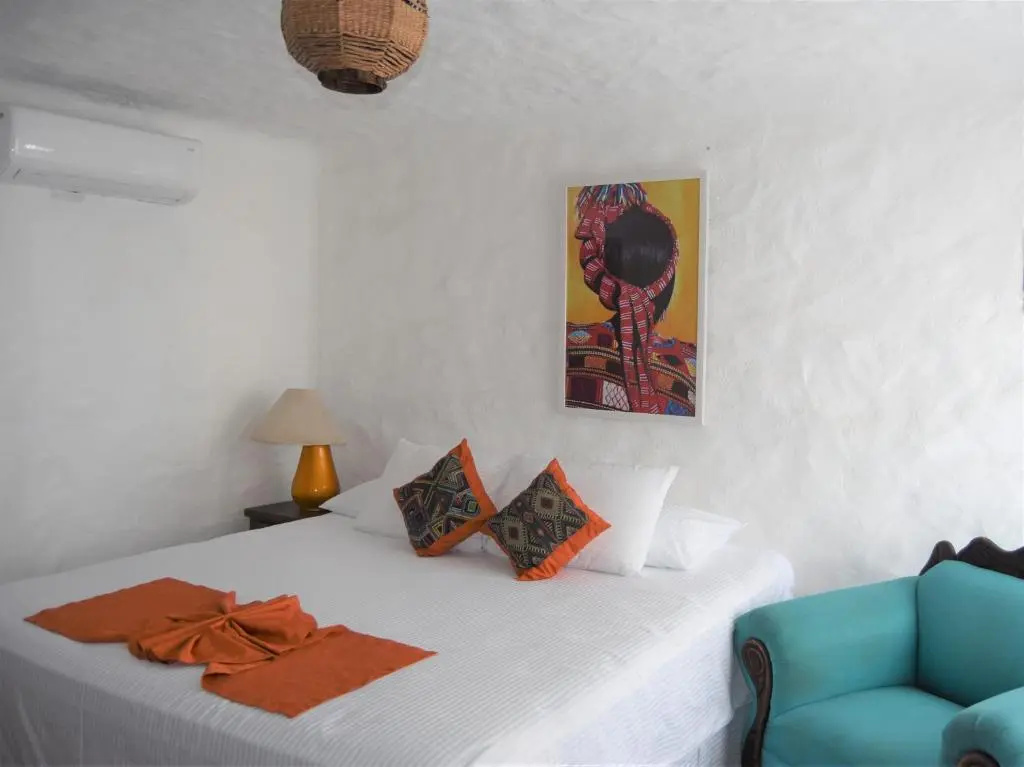 Двухместный люкс (двуспальная кровать) в Petit Hotel Pilitas