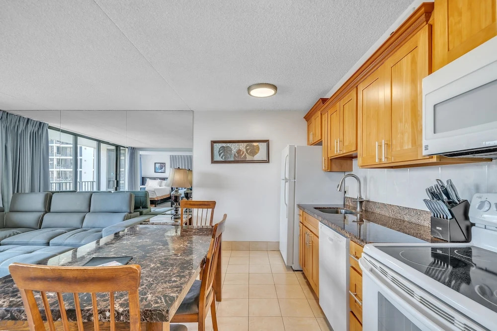 Waikiki Banyan High Level Condo with Ocean Views from the Private Lanai