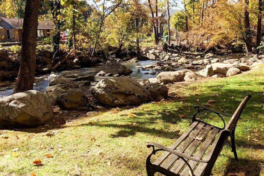 Luxe Creekside End Unit W/ Pool - Walk Downtown! 2 Bedroom Condo