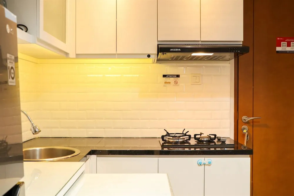 Nice and Comfort 2BR at Royal Olive Residence Apartment By Travelio
