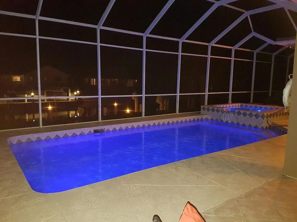 Waterfront home with pool, spa and walk to beach