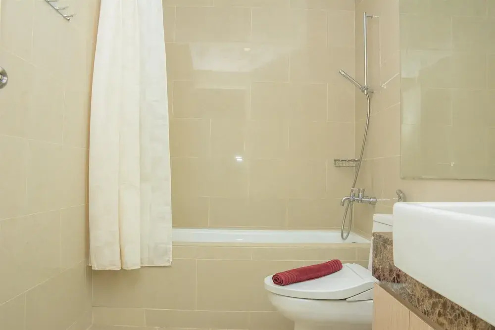 Homey And Cozy Stay 2Br At Casa Grande Apartment