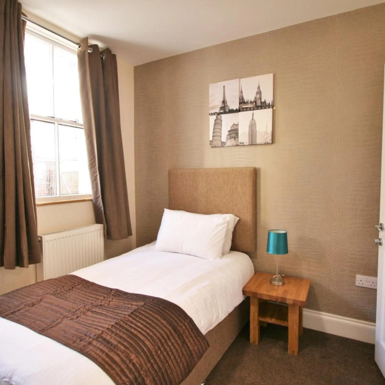 New County Hotel & Serviced Apartments by RoomsBooked