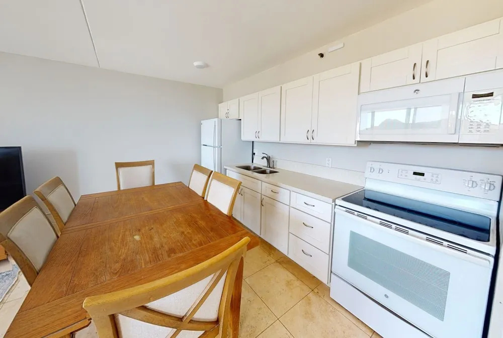 Waikiki Banyan High Level Condo with Ocean Views from the Private Lanai