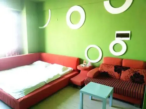 Tangtang Theme Apartment Holiday Hotel