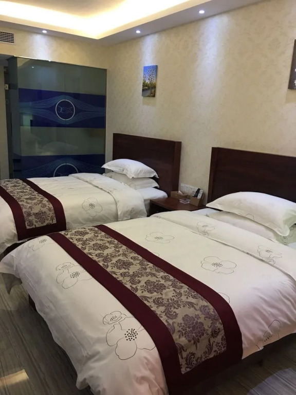 Tie Cheng Apartment Hotel