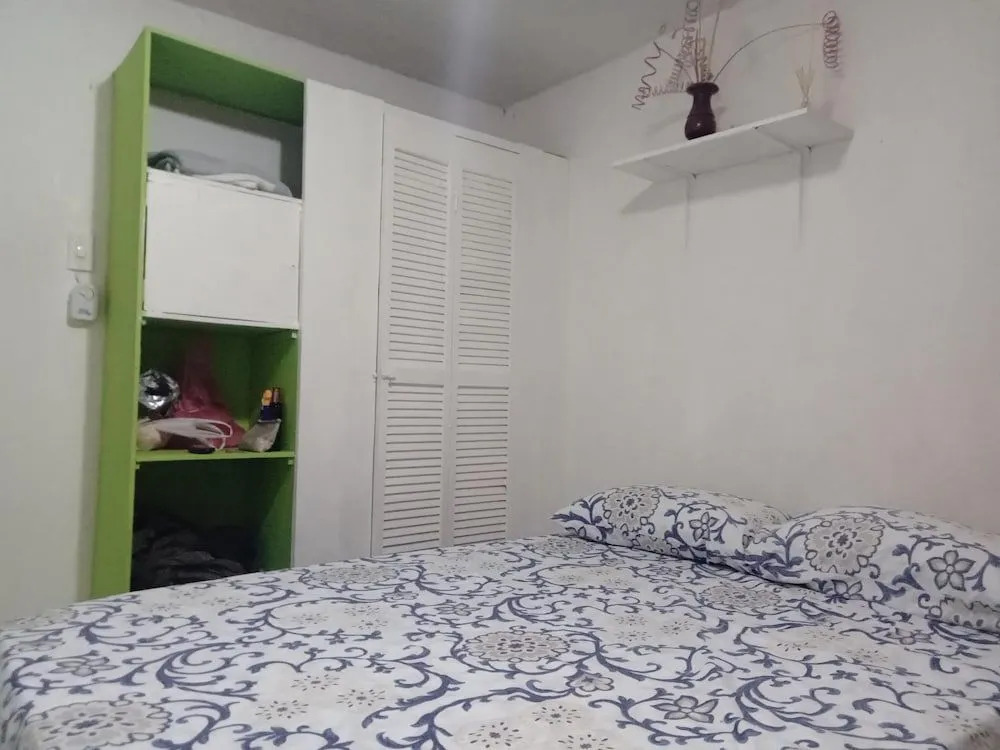 Room in Guest Room - Green Sea Inn in the San Luis Sector