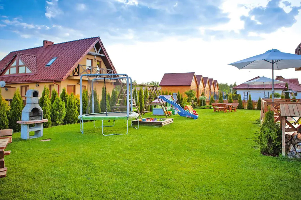 Half of holiday home, terrace, playground