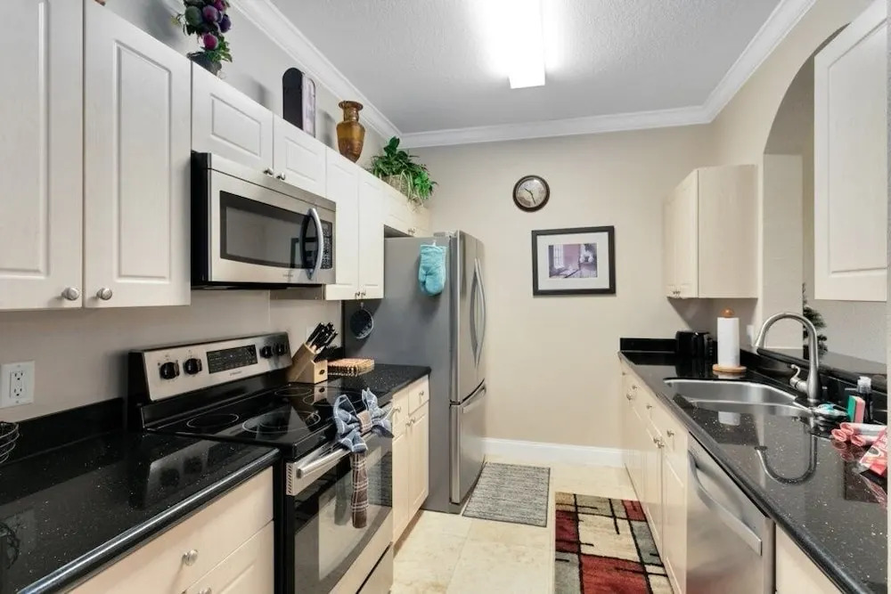 Spacious 3 Bed, 2 Bath Condo In Gated Community 3 Bedroom Condo by RedAwning