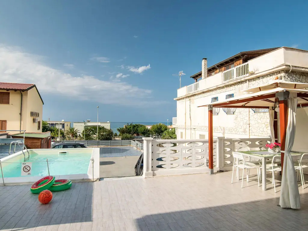 Seafront Apartment in Villa with Swimming Pool and Parking