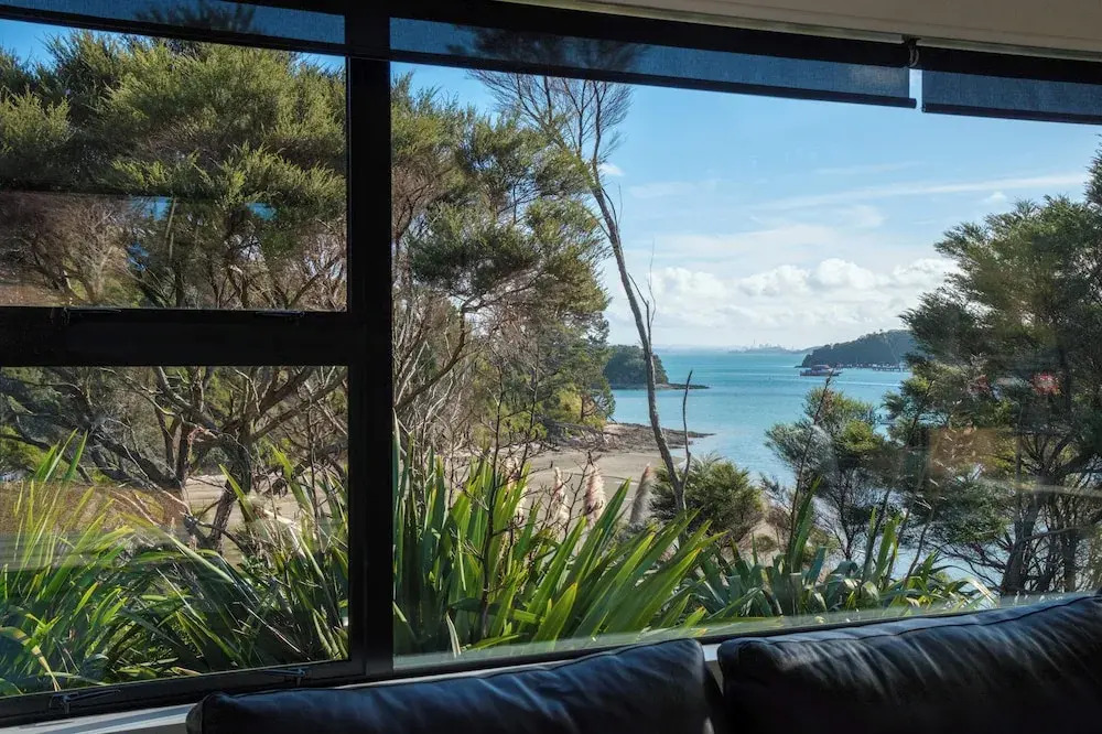 Wharetana Bay Villa with private walkway to beach