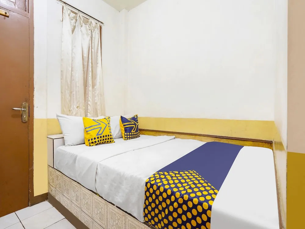 Spot On 91444 Hotel Arimbi