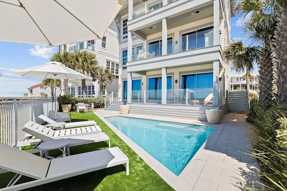 Gulf Front Luxurious Home With Private Pool And Beach Access 6 Bedroom Home by RedAwning