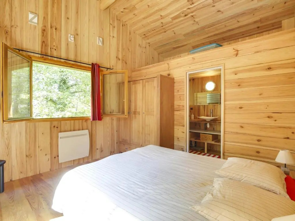 Belle villa en bois 6 personnes avec terrasse et Wi-Fi à Biscarrosse - FR-1-521-71