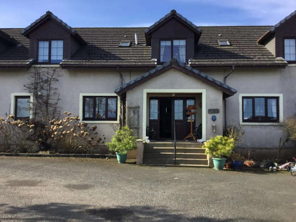 Woodcock Faulds House